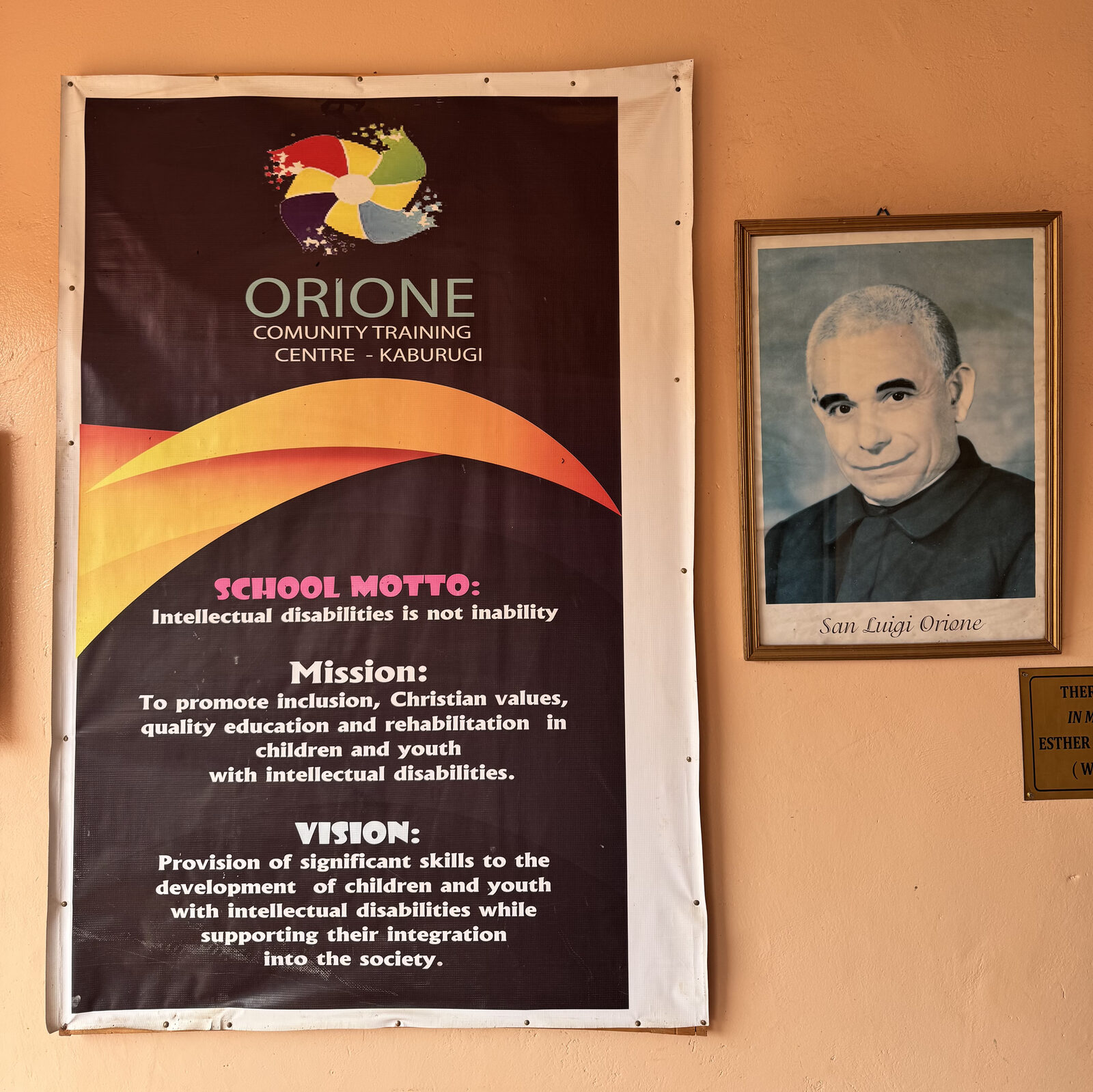 The motto of Don Orione painted at the OCTC, Kaburugi