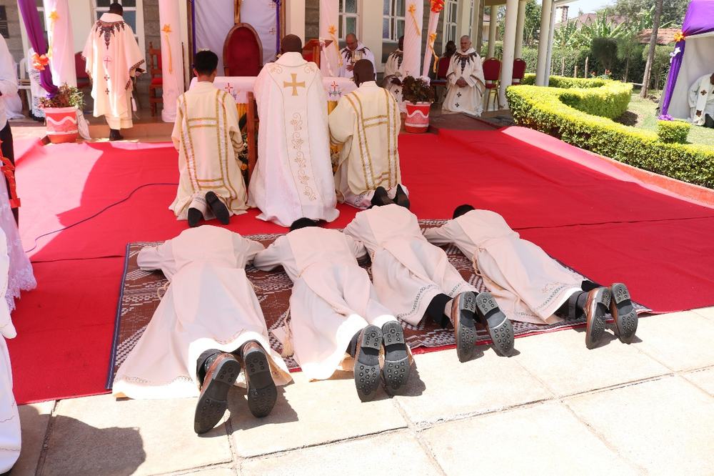 Four clerics profess perpetual vows
